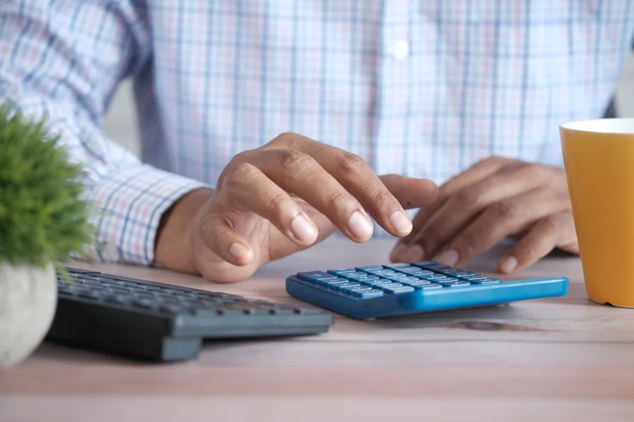 Planning care costs with a notebook and calculator